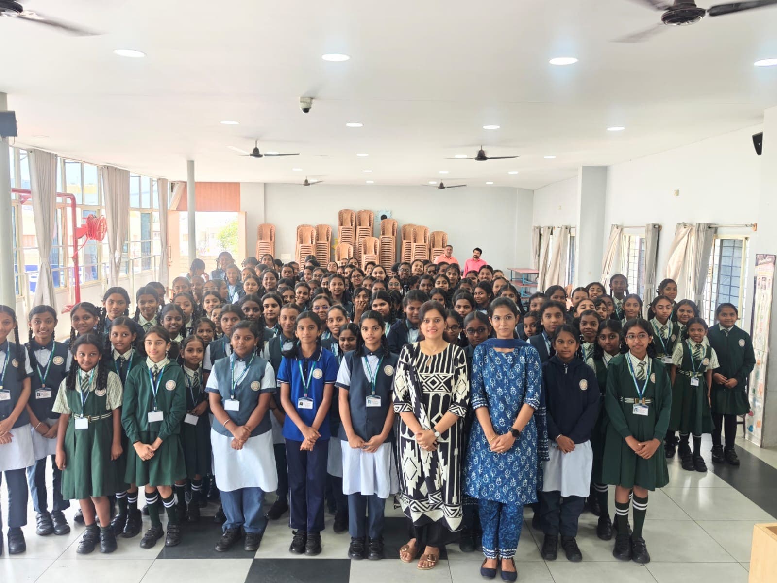 Dr. Deepshika Jha during a women's health education session with school students