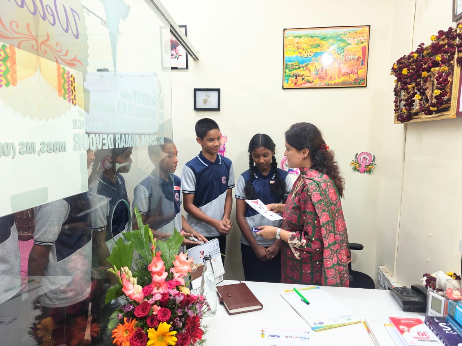 Dr. Deepshika Jha speaking with students during a health education interaction